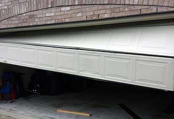 Garage Door Off Track - Honby